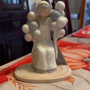 Flavia Weedn Porcelain Figurine “The Balloon Lady”